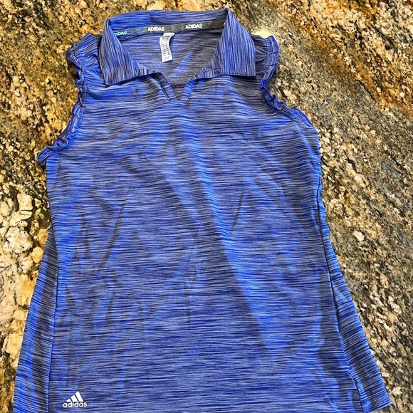 Girls golf tee shirt. Size 11–12 brand Adidas pit. Color purple